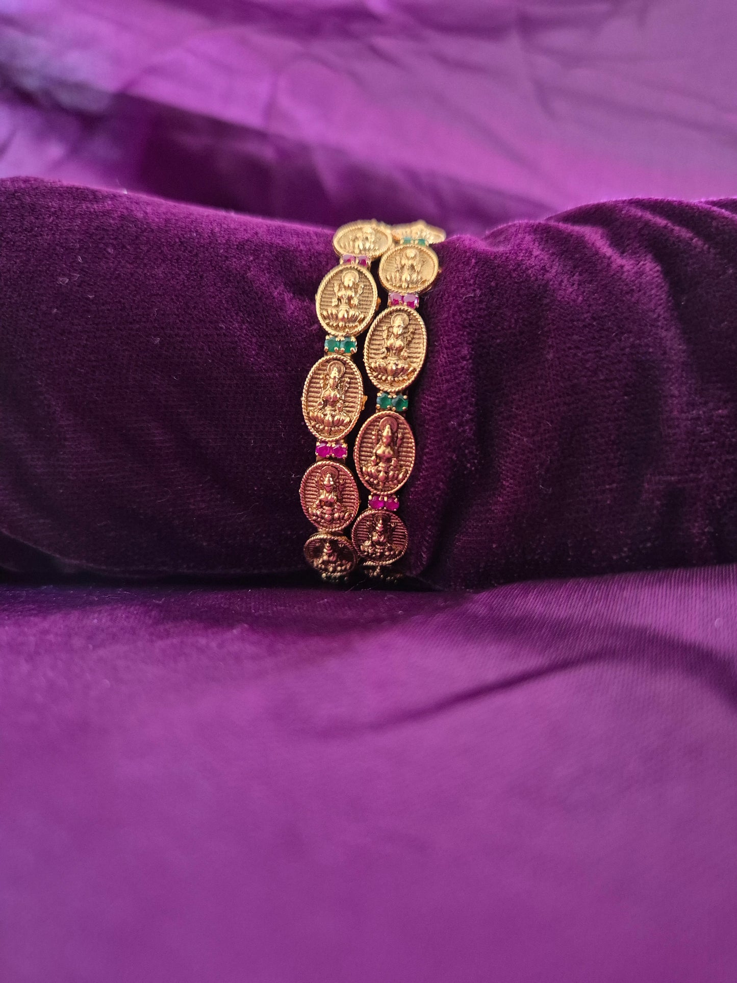 Coin Lakshmi Bangle Set With Green And Ruby AD Stones.