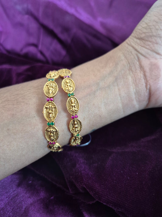 Coin Lakshmi Bangle Set With Green And Ruby AD Stones.